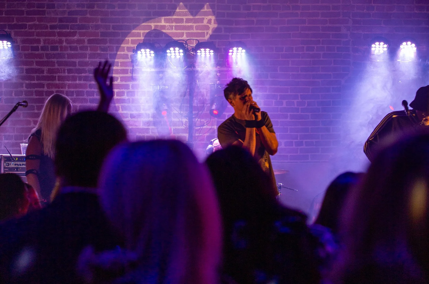 Fly By Radio, a five-piece female-fronted band, on stage